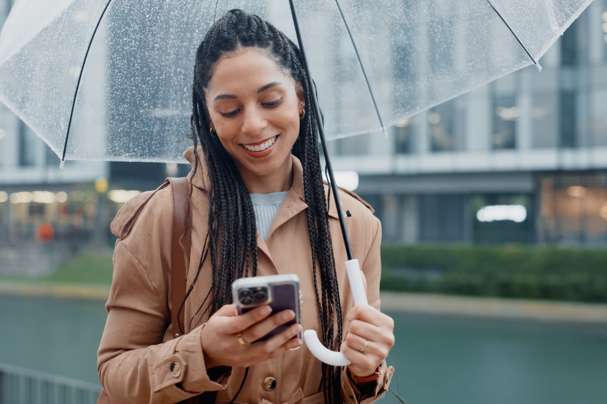 happy business owner in the rain